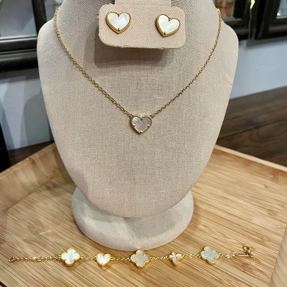 Authentic 2Pc mother of Pearl earrings and necklace white heart set only.